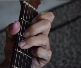 https://www.guitarlessons-atlanta.com/wp-content/uploads/2015/07/guitar-teacher-jimmy-cypher-shows-guitar-chords.png